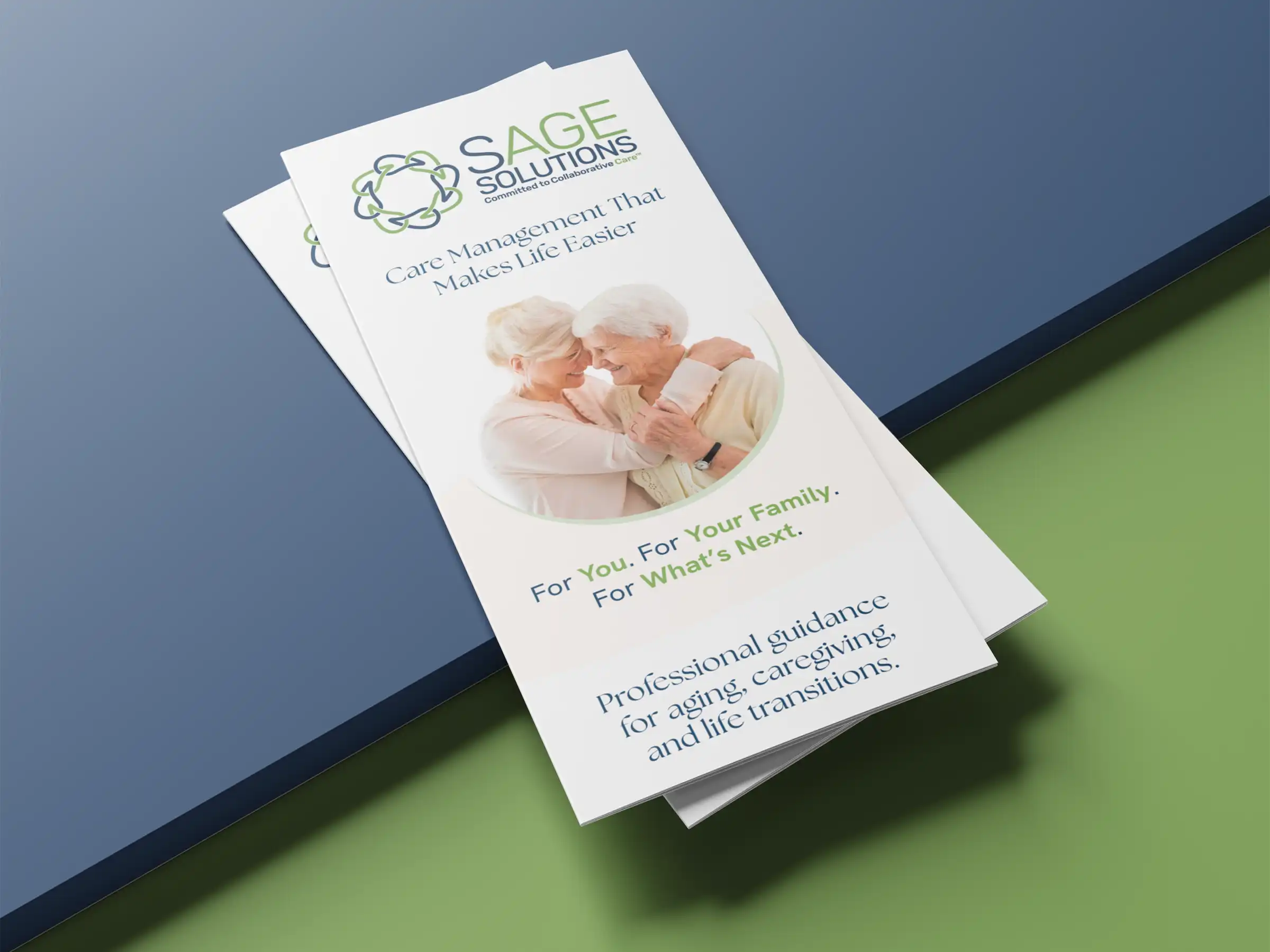 Sage Solutions brochure featuring elderly couple embracing, promoting care management services for aging, caregiving, and life transitions with tagline "For You. For Your Family. For What's Next."